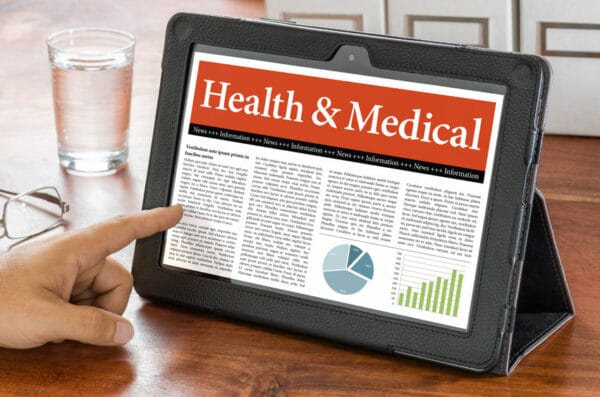 A tablet computer on a desk - Health and Medical